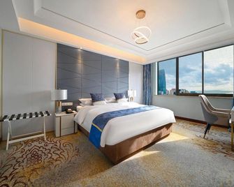 Fuxin Hotel - Qingdao - Yatak Odası