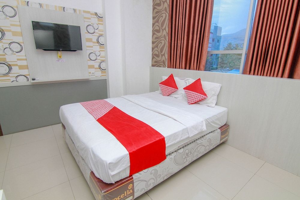 OYO 861 R Four Hotel - Palu - Chambre