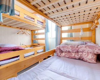 Abc Guesthouse 1f - Izumisano - Schlafzimmer