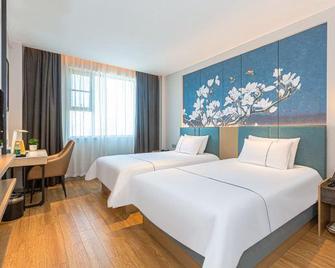 Magnotel Hotel Nanchang Minde Road Bayi Hall - Nanchang - Habitación