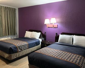 Texas Inn Mcallen Airport - מק'אלן - חדר שינה