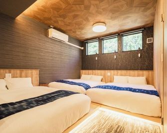 Hotel Ninestates Karatsu - Karatsu - Slaapkamer