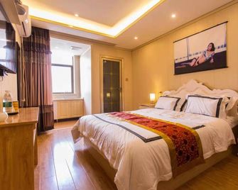 Cangzhou Qingshe Travel Apartment - Cangzhou - Bedroom