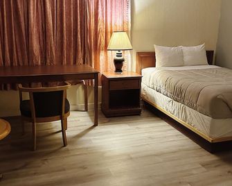 Uptown Motel - Estevan - Ložnice