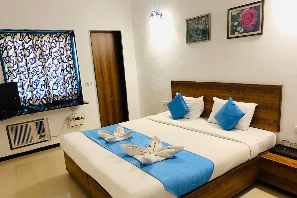 Hotel Miramar, Miramar Beach, Goa - פאנג'י - חדר שינה