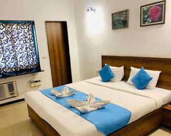 Hotel Miramar, Miramar Beach, Goa - פאנג'י - חדר שינה