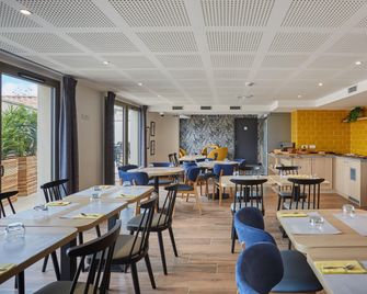 Appart'hôtel Odalys City - Nîmes Arènes - Palais des Congrès - Nîmes - Restaurant
