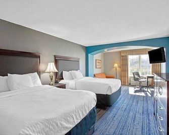 ستاي إكسبرس إن آند سويتس - موبيل ال - موبيل - غرفة نوم