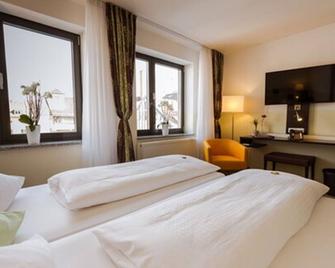 Hotel Arooma - Erding - Schlafzimmer