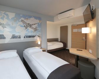 B&B Hotel Berlin-Airport - שונפלד (ברלין) - חדר שינה