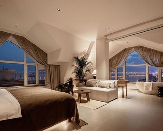 Dalian Jinshi Designer Homestay - Dalian - Bedroom