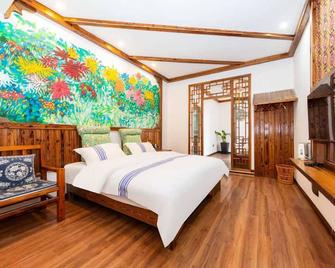 Hotel California Zhangjiajie - Zhangjiajie - Bedroom
