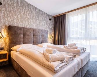 Zillertal Suites Fügen By Alps Resorts - Fugen - Yatak Odası