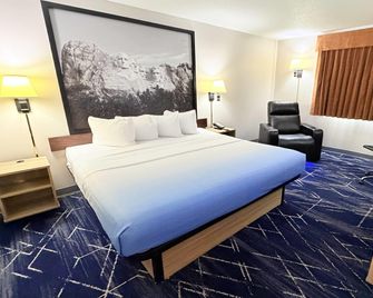 Super 8 by Wyndham Hot Springs - Hot Springs - Schlafzimmer