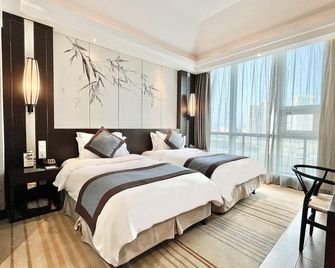 Eco Grand Hotel - ג'יאנגסו - חדר שינה