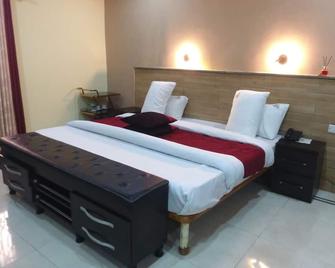 Choice Gate Hotel And Suites - Benin City - Bedroom