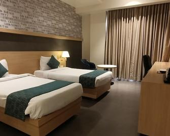 Gopalas Residency - Bhiwandi Hotels - Bhiwandi - Bedroom