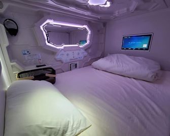 Hotel Galaxy Pod - Yoshikawa - Camera da letto