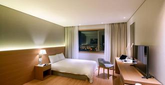 Astar Hotel - Jeju City - Bedroom