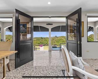 Private Hill surrounded by natural mountains, neighbored to secluded beaches. - Manatí