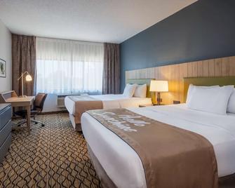 Days Inn & Suites by Wyndham Rochester Hills MI - Rochester Hills - Bedroom