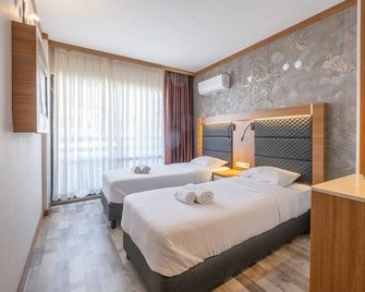 Sunday Beach Hotel - Kusadasi - Sovrum