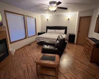 High End King Suite c/w Living room, 2 Fireplaces, 2 Smart TVs, Kitchenette. - Three Hills