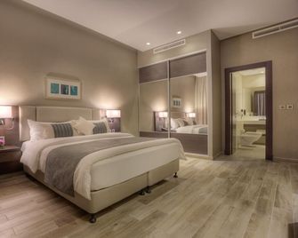 The House Boutique Suites - Ammán - Habitación
