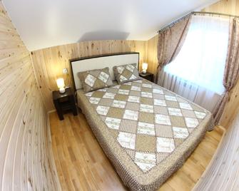 Guest House Altin - Kostroma - Schlafzimmer