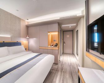 Homeinn Selected Hotel (Huzhou Aishan Yintai City Yishang Street) - Huzhou - Habitación