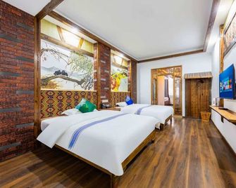 Zhangjiajie Shi Guang Zhi Wai Boutique Hotel - Zhangjiajie - Schlafzimmer