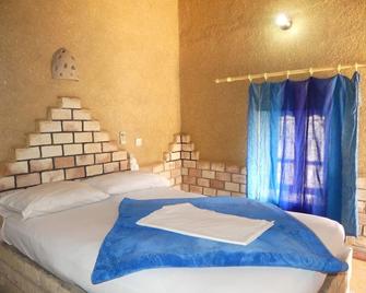 Les Pyramides Hotel Merzouga - Merzouga - Schlafzimmer