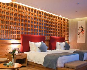 Zixuan Holiday Hotel - Tongling - Yatak Odası