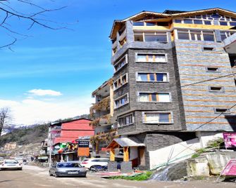 Capital O 31039 Whispering Valley Resort - Manali - Building