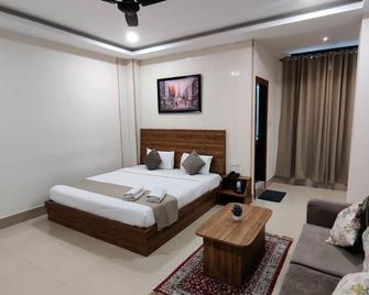 Happy Home Living - גוואטי - חדר שינה