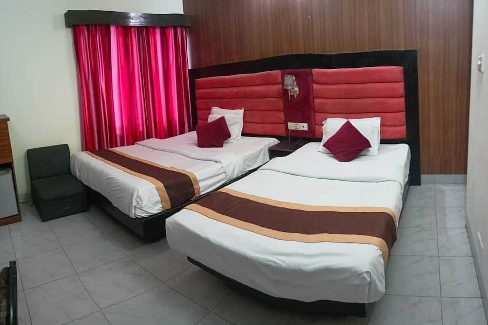 هوتل سكاي لينك - دكا - غرفة نوم