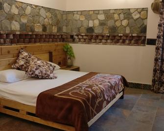 Harmony With Nature & Self | Hilltop, Airport Road - Dehradun - Bedroom
