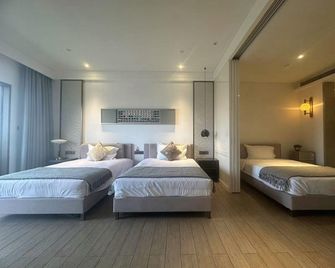 Sanya Cloud View Resort Apartment (Rock Platinum Branch) - Sanya - Schlafzimmer