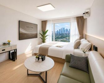 Eletel Apartment Hotel - Beijing - Bedroom