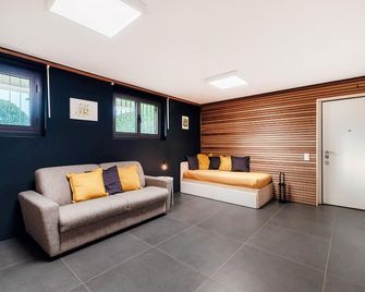 Modern Flat by Quokka 360 - In the hills bordering Italy - Vacallo - Living room