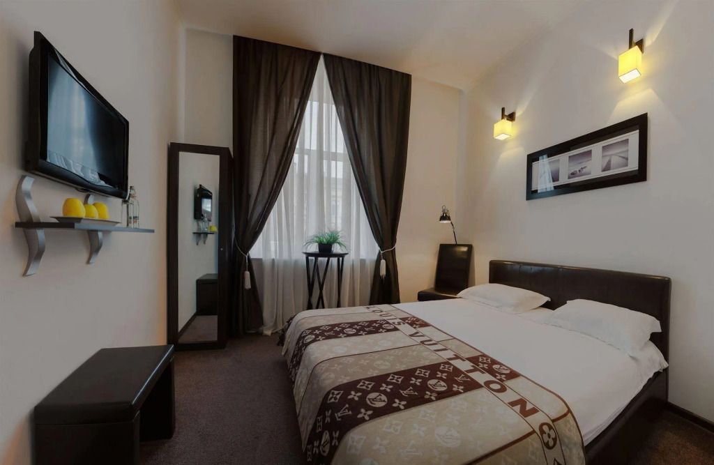 Reno Hotel - אודסה - חדר שינה