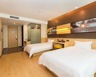 Iu Hotel Changsha Railway Station Branch - צ'נגשה - חדר שינה