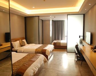 Aoyou International Apartment Hotel A Mall Brunch - Cantón - Habitación