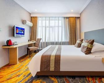 Desheng Hotel - Hulunbuir - Slaapkamer