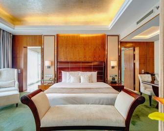 Jincheng Haoxiang Jinnian Hotel - Jincheng - Bedroom