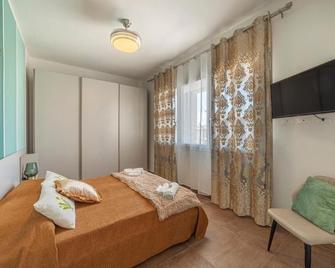 Prima dell'Elba Family Apartments - Piombino - Camera da letto