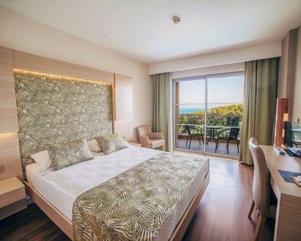 Water Planet Hotel & Aqua Park - Okurcalar - Bedroom