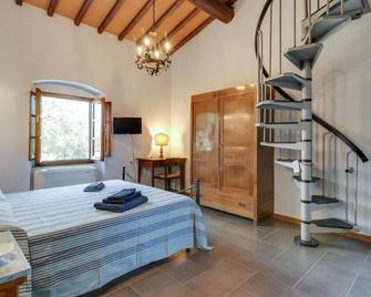 Belvilla by OYO Tranquil Farmhouse near Nightlife - Terranuova Bracciolini - Camera da letto