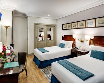 Sercotel GH Conde Duque, an Ascend Collection Hotel - מדריד - חדר שינה