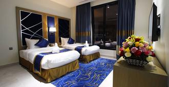 Diwan Residence Hotel Alnaeem - Jeddah - Bedroom